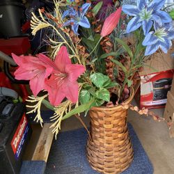 Wicker basket, vase with flowers