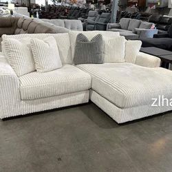 🎈 Lindyn Ivory 2 PCs RAF Sectional With Chaise By Ashley Furniture 