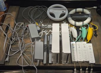 Nintendo Wii Bundle with Mario Kart, Mario Party,  Super Smash Brothers and more...