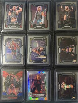 Various trading cards from WWE, AEW, UFC, Marvel Etc