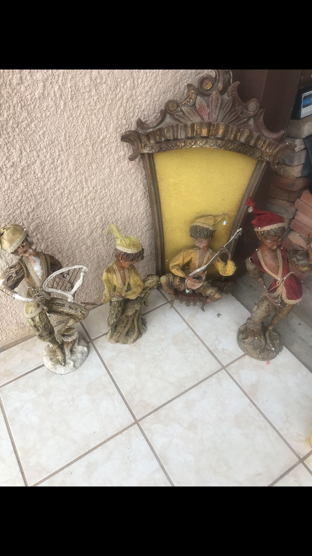 statues Victorian elves.