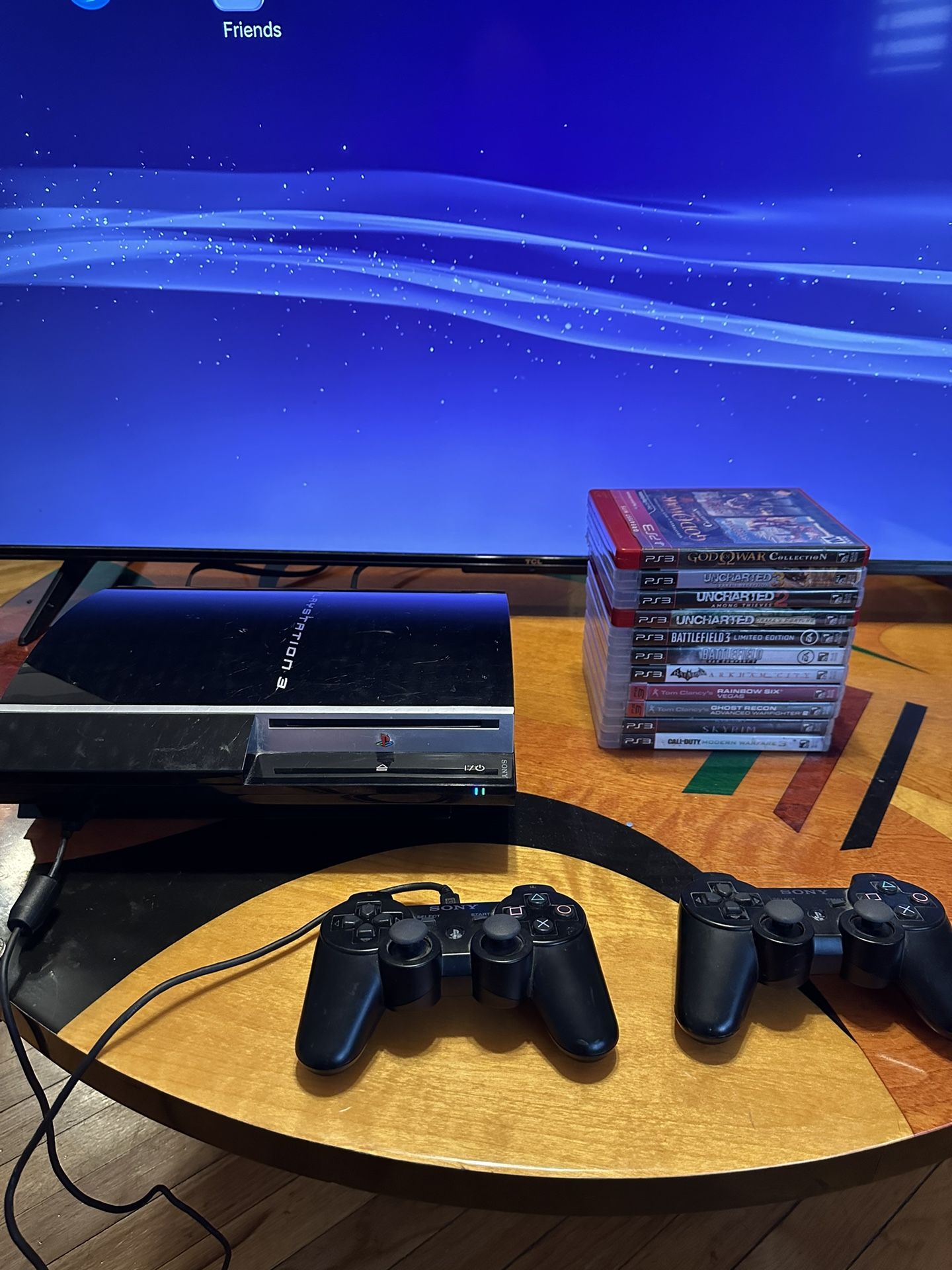 PS3 w/ 11 Games + 2 Controllers