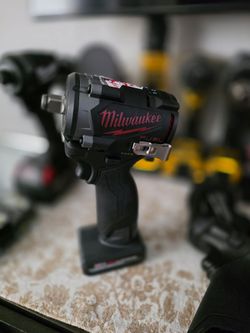 Milwaukee M12 FUEL 1/2 inch impact with 5.0 high output battery