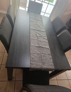 Comedor gris  de 6 sillas