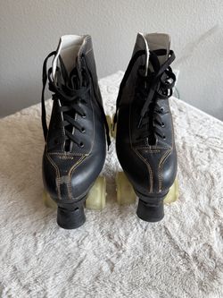 Black leather roller skates with light up wheels