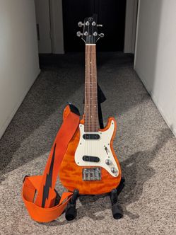 Used Vorson ST (Strat) style electric tenor ukulele in quilted orange