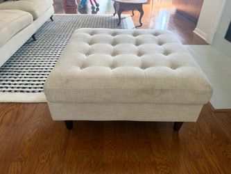 Beige tufted linen ottoman