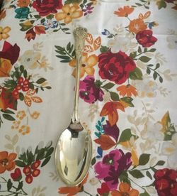 Heavy, large serving spoon. Silver plated?