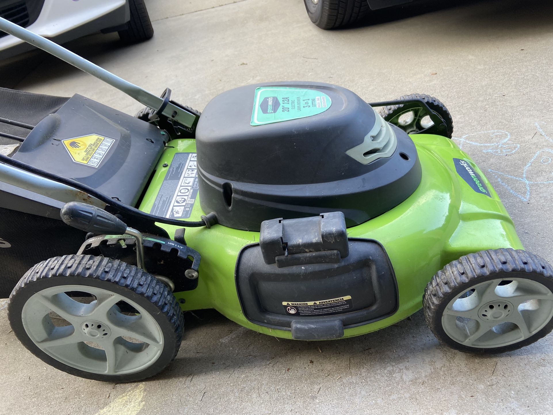 Greenworks 21’’ Corded Electric 12 A  lawn mower 