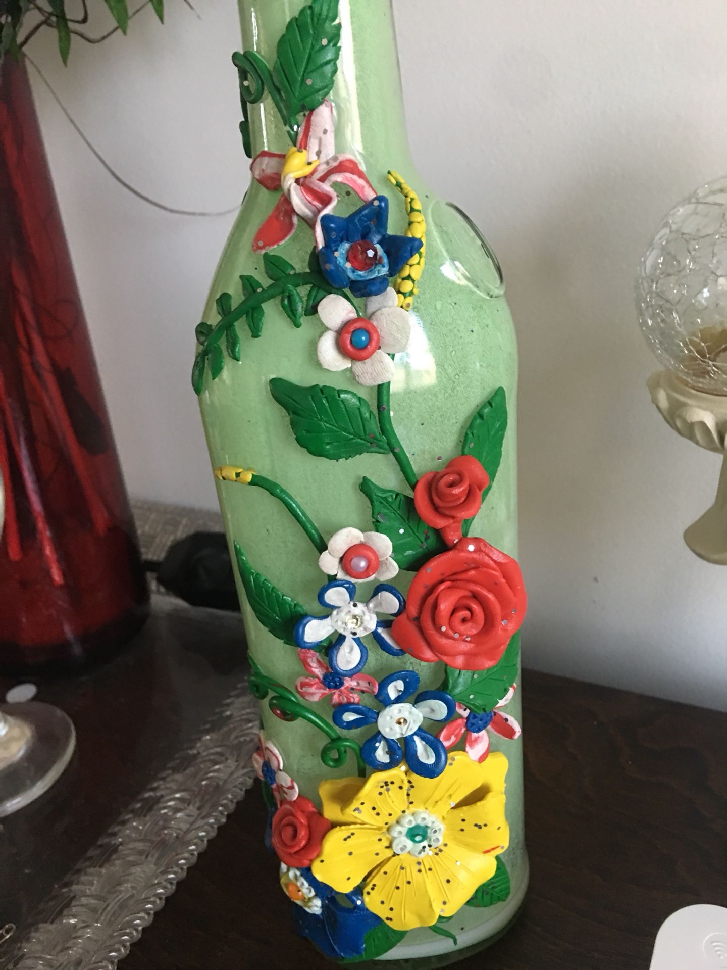 Hand made clay art on a bottle!