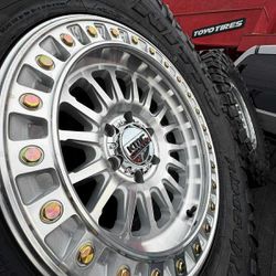 17" KMC WHEELS AND TIRES 35 1250 17 NITTO