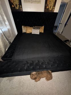 Black bed frame W/ California king mattress
