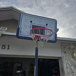 Basket Ball Hoop And Stand. Hop Slightly Missing 1 String