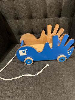 Pikolino brand wooden pull toy wagon