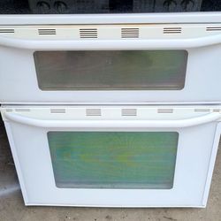 White double oven electric stove.
