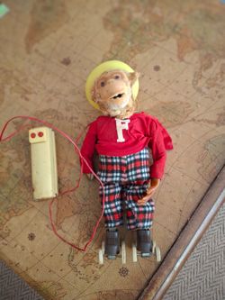 Vintage remote control roller skating monkey toy