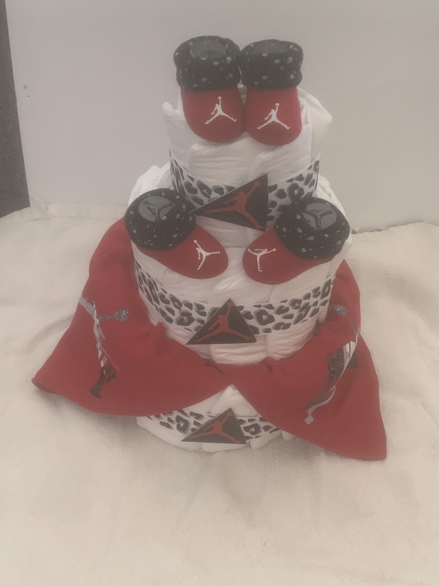 New 3 Tier Jordan Diaper Cake 30 Diapers, 2 Shoe Socks And 2 Baby Bibs