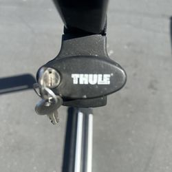 Thule cross bars and ski rack