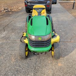 John Deere L130 48" cut riding lawn mower