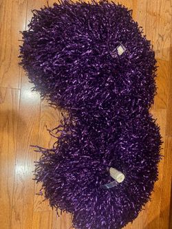 Large purple pom-pom think from college