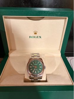 Rolex Oyster Perpetual with green dial