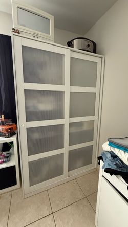 White sliding door wardrobe