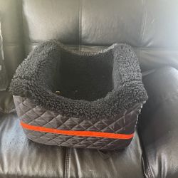 Pet booster seat for a car or bicycle. Not sure if all the straps are there. We only used as a booster in van. Cash only. Everett/Pinehurst pick up ar