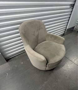 Gray Pottery Barn groovy swivel chair
