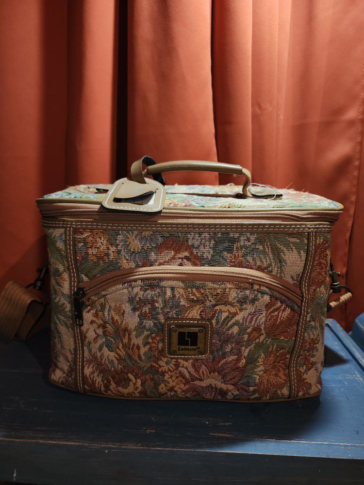 Vintage carry on makeup luggage.