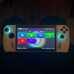 rog ally z1 extreme with hollow effect joysticks and dock 
