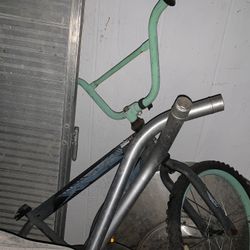 Two Mountain Bikes And Two Children’s Bicycles