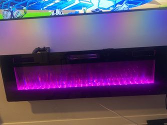 60 inch electric fireplace. Hardly used. 
