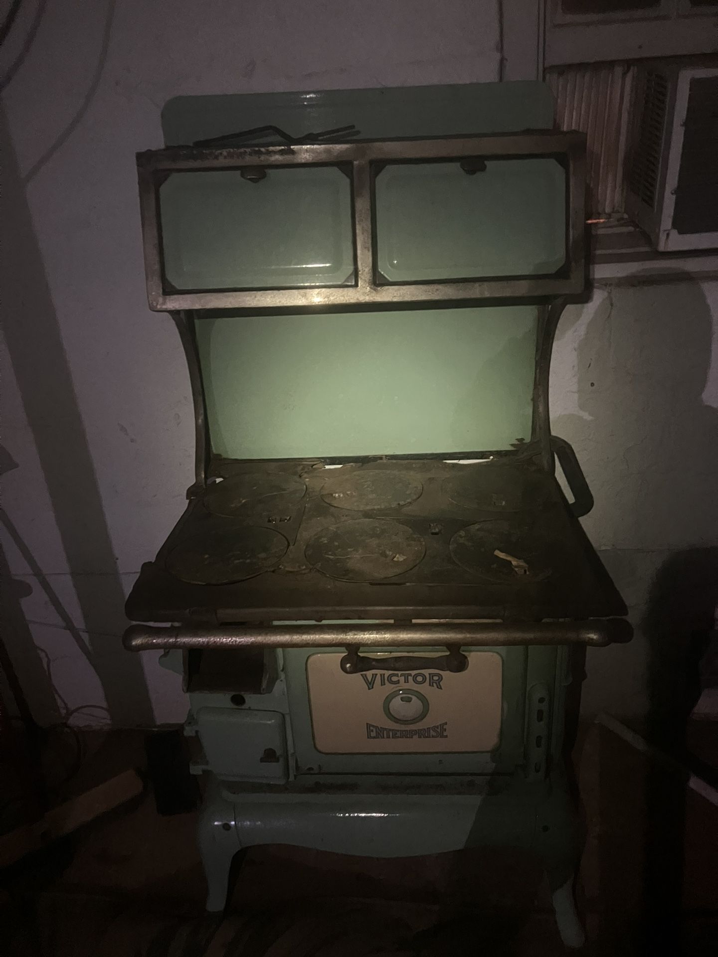 Antique 1940s Victor and enterprise cooking woodstove