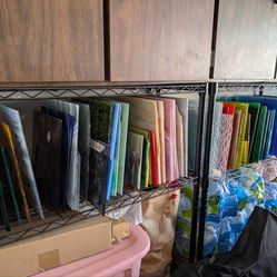 Lot of 100 pieces of stained glass. Various sizes, but most are 12 x 12 and various colors.