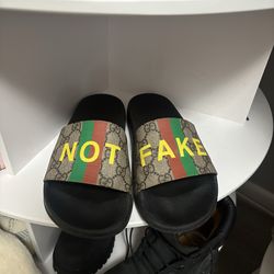 GUCCI SLIDES “NOT FAKE”