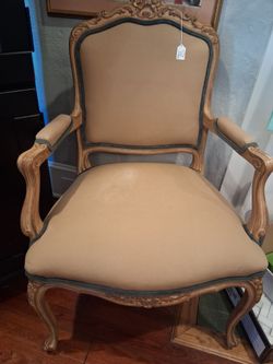 French Provincial Carved Wood Armchair