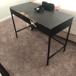 Original desk from target. In good condition. Paint job gone wrong. Electrical outlet works. 