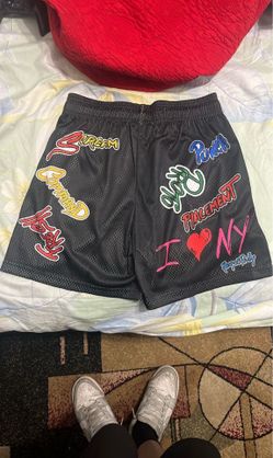 EE SHORTS AND JORDAN 4 yellow thunders