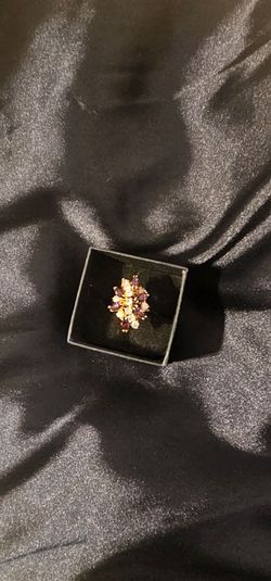 Gold ring with gemstones