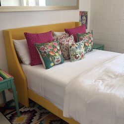 Yellow queen size bed with mattress