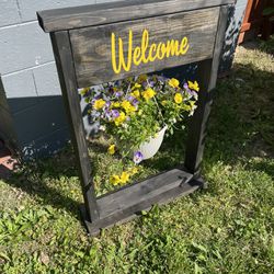 Welcome Sign with Flowers