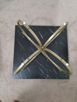 Faux marble coffee table black with golden color