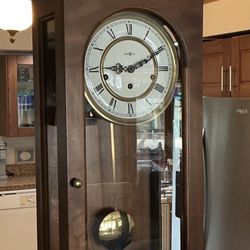 Howard Miller Triple Chime Wall Clock Model 612–581  #143 German Movement W/Key 31“ H x 11“ W x 6“ D (All LWorks Like It Should )(Very Good Condition)