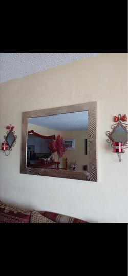 Golden rim mirror and candle holders