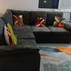 SOFA CAMA TIPO SECCIONAL CON COMPARTIMENTO PARA GUARDAR.