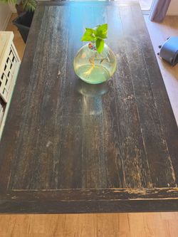 Ashley Furnture 6x4 solid wood table with leafs to extend to 10 feet