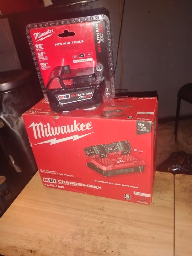 New Battery And 2 charger New And The Box