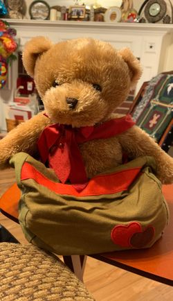 Plush 14 inch brown bear inside canvas bag with hearts