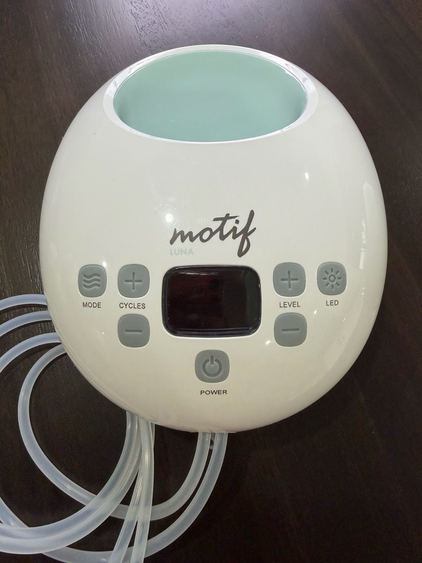 Motif breast pump