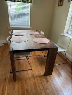 Dark solid wood dining table (Crate&Barrel)